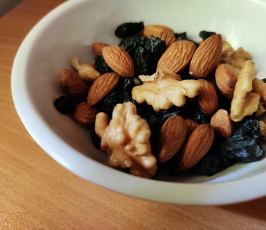 비만의 위험성과 예방을 위한 실천 방안 brown and black nuts on white ceramic bowl