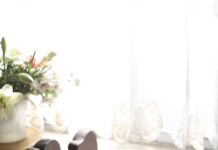 만성피로, 일상이 힘든 이유와 극복을 위한 생활습관 변화 woman sleeping on bed beside book