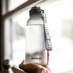 “끝나지 않는 피로감, 생활 속 작지만 확실한 변화로 극복하세요” person holding gray and black tumbler