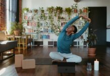‘마음 건강’ 지키기, 일상 속 작은 변화가 큰 힘 된다 a man is doing yoga in a living room