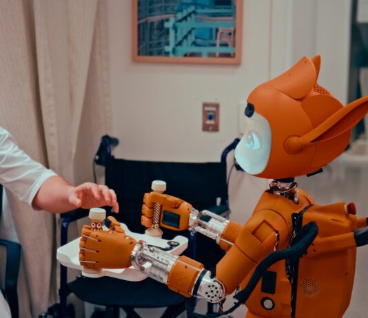 “AI로 똑똑하게 챙기는 건강 습관, 내 집에서 시작된다” Man gives robot bottles on a tray